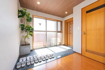 a room with a window with a plant in it at SUA HOTEL Hikifune in Tokyo