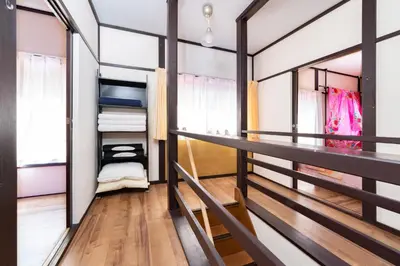 a room with a balcony with a closet at 6BR 10Beds Direct to Shinjuku, Shibuya ,Tokyo Dome, Central ,Budget Friendly in Tokyo