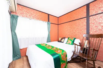 a bedroom with a bed and a window and a chair at 6BR 10Beds Direct to Shinjuku, Shibuya ,Tokyo Dome, Central ,Budget Friendly in Tokyo
