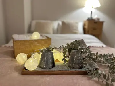 a tray with christmas decorations on top of a bed at \u5c71\u624b\u7dda\u300c\u5927\u585a\u99c5\u300d\u5f92\u6b69\uff15\u5206\u3000\u8cb8\u5207\u90e8\u5c4b in Tokyo