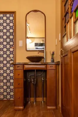 a bathroom with a sink and a mirror at \u6728\u9999Mokkoh Modern Japanese style room by train15 minutes to Tokyo Station in Tokyo