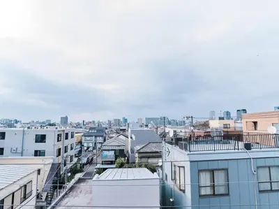 a view of a city with buildings at Evergreen Apartment Hotel in Tokyo