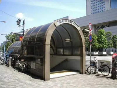 a building with bikes parked in front of it at Evergreen Apartment Hotel in Tokyo