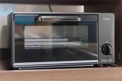 a toaster oven sitting on top of a counter at Oyama - Diamond Yu in Tokyo