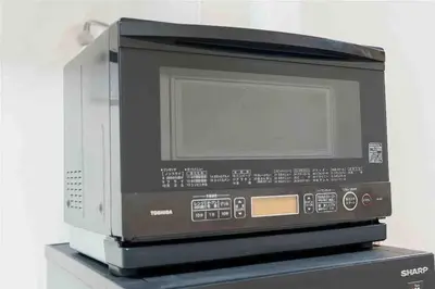 a microwave oven sitting on top of a counter at Oyama - Diamond Yu in Tokyo