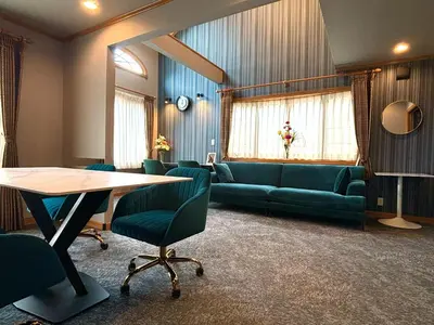 a conference room with a table and green chairs at Five room 120 SKY TREE SENSOJI FreeParking 1292sqft in Tokyo