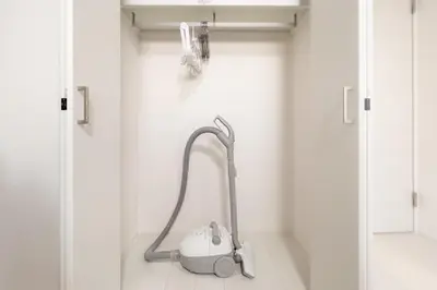 a walk in shower with a white bathroom with a white floor at aLATO\u9326\u7cf8\u753a in Tokyo