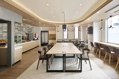 a dining room with a table and chairs at WASHINGTON R&B Hotel Ueno Hirokoji in Tokyo