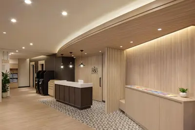 a lobby of a store with a reception desk and a counter at WASHINGTON R&B Hotel Ueno Hirokoji in Tokyo