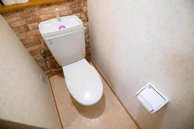 a bathroom with a white toilet in a stall at Rea\u65b0\u5c0f\u5ca92\u4e01\u76ee403 in Tokyo