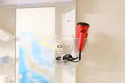 a red flashlight is hanging from a wall at Tokyo Shinjuku hotel in Tokyo