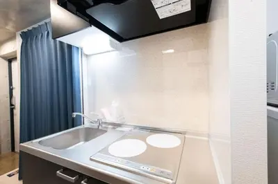 a bathroom with a sink in a room at Ferio\u84b2\u7530II in Tokyo