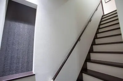 a staircase in a house with white walls and a window at ks\u897f\u65e9\u7a32\u7530 in Tokyo