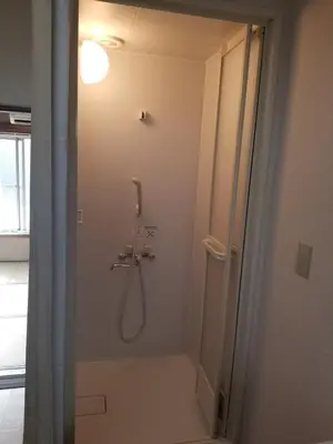 a shower stall in a bathroom with a shower at Little Bird Takinogawa #1 in Tokyo