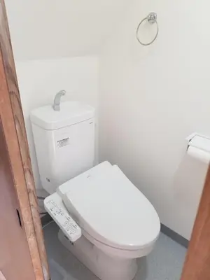 a bathroom with a white toilet with a remote control at Little Bird Takinogawa #1 in Tokyo