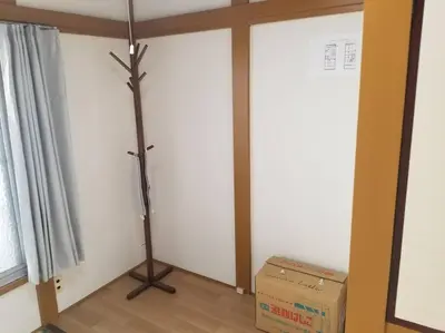 a room with a christmas tree in the corner at Little Bird Takinogawa #1 in Tokyo