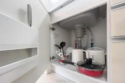 a cupboard with a kitchen utensils and a mixer at \u3055\u304f\u3089\u307f\u3061\u30c6\u30e9\u30b9 in Tokyo