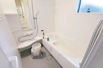 a bathroom with a sink and a toilet and a mirror at \u897f\u5de3\u9d28HOUSE in Tokyo