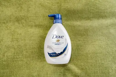 a bottle of laundry detergent sitting on a green surface at Shibuya E Address 303 in Tokyo