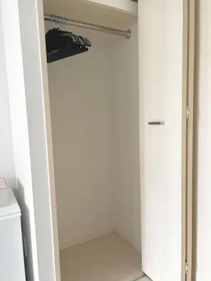 a walk in closet with a white door and a closet at 4 min walk from Shibuya Station! (From A0 Exit) in Tokyo