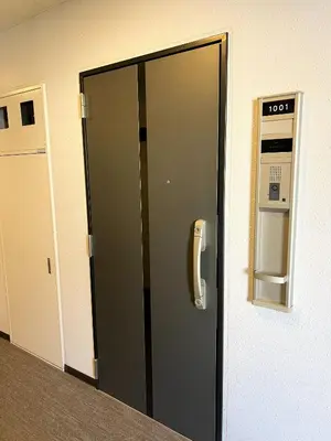 an elevator in an office with a phone on the wall at 4 min walk from Shibuya Station! (From A0 Exit) in Tokyo