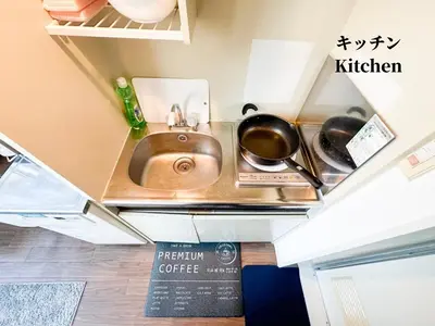 a kitchen with a copper sink and pots and pans at 7\u6642IN19\u6642OUT # \u65b0\u5bbf\u99c5\u96fb\u8eca4\u5206 # \u99c58\u5206 # \u65b0\u898f\u30ea\u30ce\u30d9\u30fc\u30b7\u30e7\u30f3 # \u6700\u59275\u540d # \u5c02\u7528\u30d0\u30b9\u30ad\u30c3\u30c1\u30f3 # 7 00 IN19 00 OUT # 4 min train to Shinjuku # 8 min walk to station # Newly renovated # Max 5 guests # Private bath kitchen in Tokyo