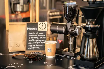 a coffee maker and a cup on a counter at ALFIT HOTEL & BAR AKASAKA in Tokyo