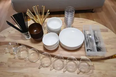 a group of wine glasses and utensils on a table at \u30e1\u30be\u30f3\u516b\u5343\u4ee3302 in Tokyo