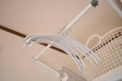 a white fan is hanging from a ceiling at \u30e1\u30be\u30f3\u516b\u5343\u4ee3302 in Tokyo