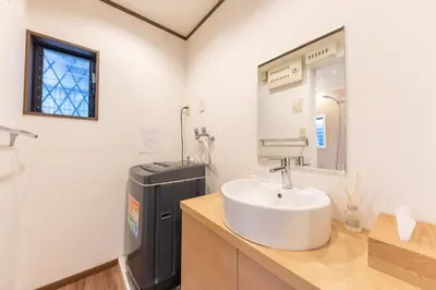 a bathroom with a sink and a water heater at Shibuya-ku - Apartment - Vacation STAY 72295v in Tokyo