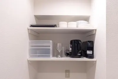 a shelf with a coffee maker and other items on it at Shibuya-ku - Apartment - Vacation STAY 67815v in Tokyo