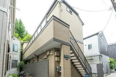 a building with a staircase on the side of it at \u30d1\u30a4\u30f3\u30b3\u30fc\u30c8 in Tokyo