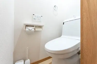 a bathroom with a white toilet in a room at \u30d1\u30a4\u30f3\u30b3\u30fc\u30c8 in Tokyo