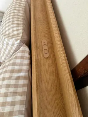 a close up of a bed with a pillow and a button at \u6c34\u4ed9 Kamata in Tokyo