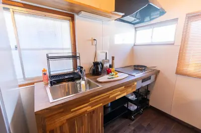 a kitchen with a sink and a counter top at \u548c\u6c23\u4f1a\u3005\u65b0\u5927\u4e45\u4fdd Wakiaiai Shinokubo in Tokyo