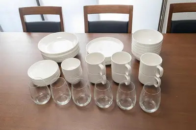a group of empty wine glasses sitting on a table at Apro Stay \u7530\u5712\u8abf\u5e03\u591a\u6469\u5ddd in Tokyo
