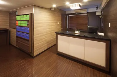 a kitchen with a counter and a drink refrigerator at FLEXSTAY INN Shirogane in Tokyo