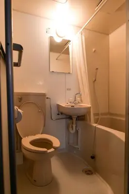 a bathroom with a toilet and a sink at J-Court Oshiage in Tokyo