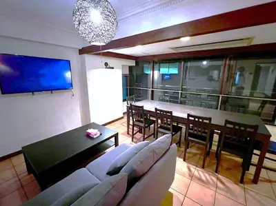 a living room with a table and a dining room at NEW OPEN 4BR, 110\u33a1 Walk to Asakusa in Tokyo