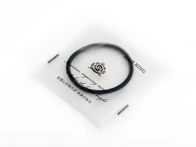 a white envelope with a black ring on it at APA Hotel Higashi Nihombashi Ekimae in Tokyo