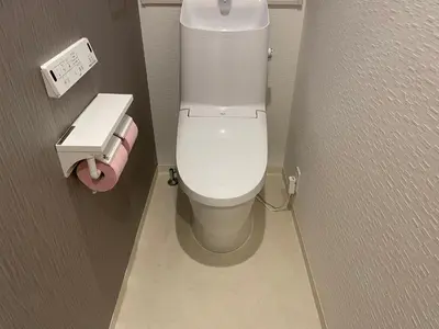 a bathroom with a white toilet in a stall at Private Hotel Season Spring in Tokyo