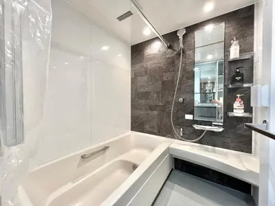 a white bathroom with a tub and a sink at Sugamo-4F-TS0337 in Tokyo