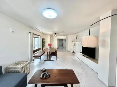 a living room with a couch and a table at Sugamo-4F-TS0337 in Tokyo