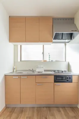 a kitchen with wooden cabinets and a stove at hidden valley - Vacation STAY 40561v in Tokyo