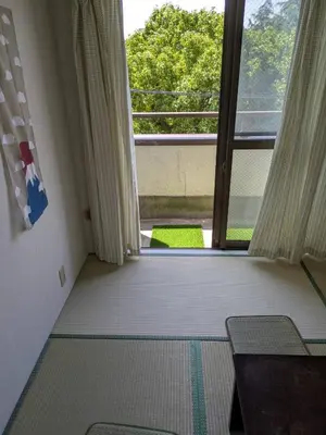 an empty room with a large window in a room at Wise Park Mukojima in Tokyo
