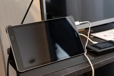 a laptop computer sitting on top of a desk at \u30ea\u30ce\u30b9\u30bf\u30a4\u30eb\u62bc\u4e0a in Tokyo