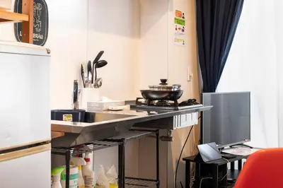 a kitchen with a sink and a counter top at \u30ea\u30ce\u30b9\u30bf\u30a4\u30eb\u62bc\u4e0a in Tokyo
