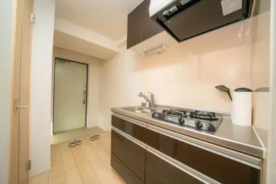 a kitchen with a sink and a stove at shinjuku1 in Tokyo