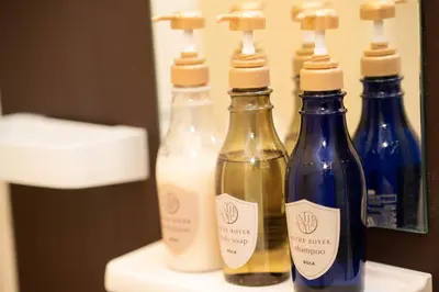 a group of four bottles sitting on a table at shinjuku1 in Tokyo