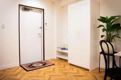 a mirror on the floor in a room with a door at #4New open 3stops to Shinjuku spacious stylish apartment in Tokyo